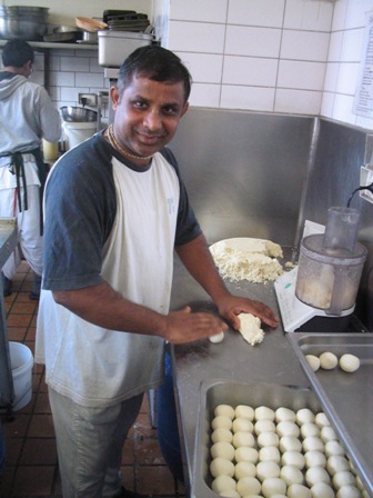 Brajabasi rolls Rasagulla: 